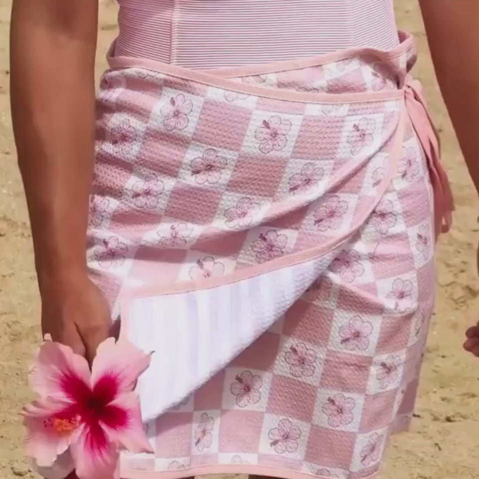 lady wearing a beach towel wrap skirt