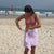 girl shoeing how to put on a towel wrap skirt