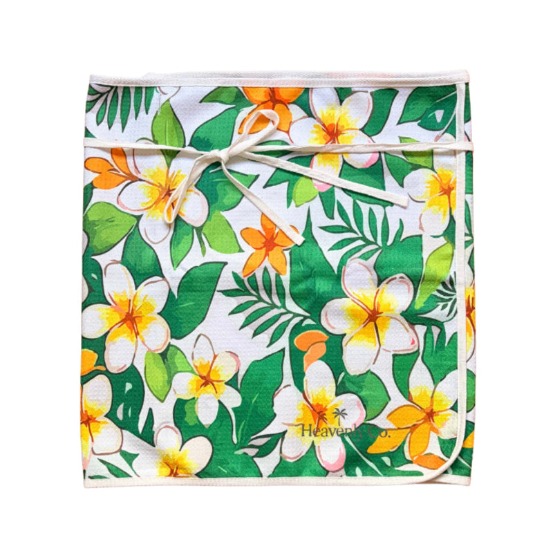 wrap skirt with tropical floral design and 'Heaven' branding.